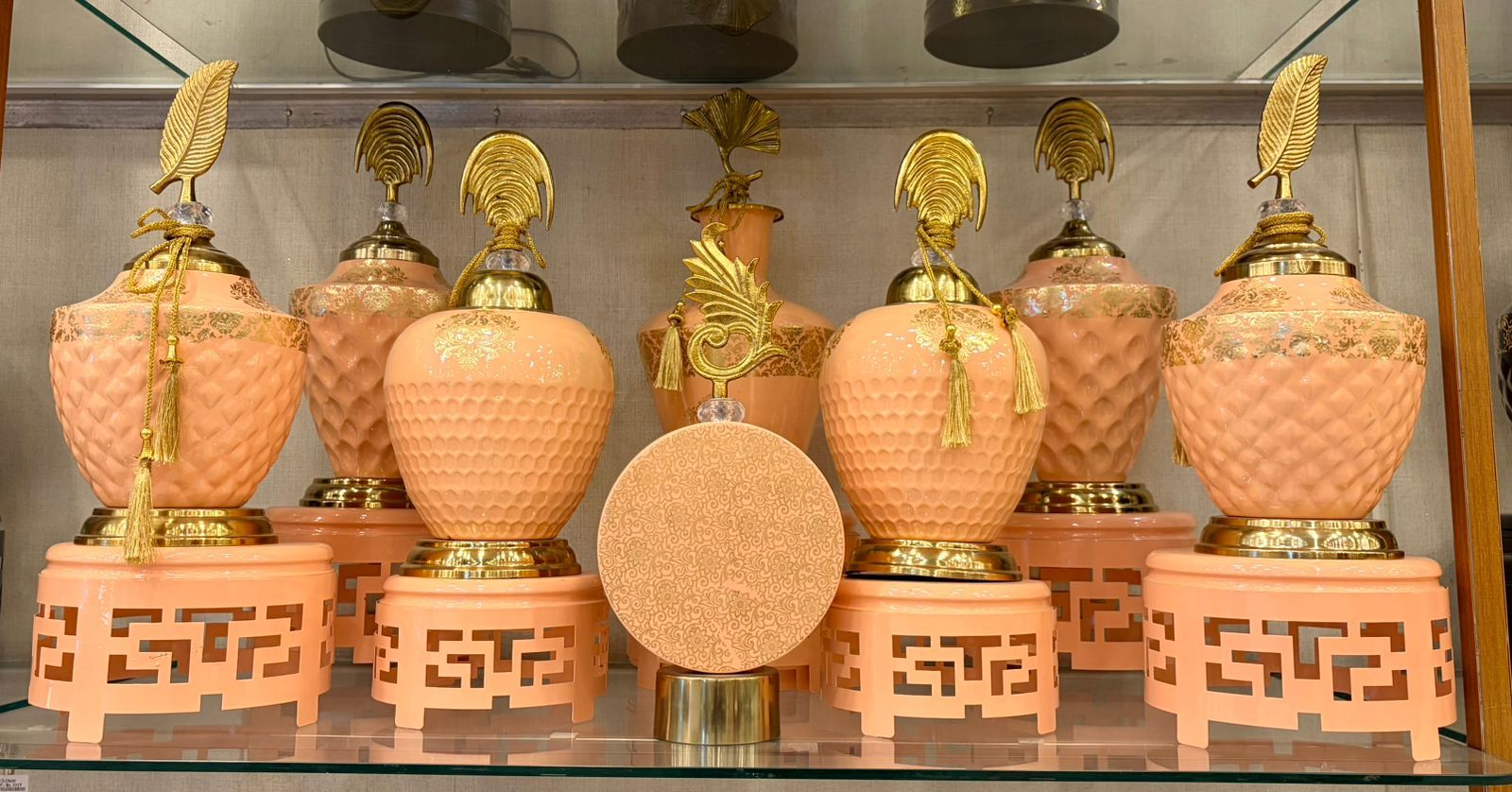 Peach and Gold Showpieces with Leaf Finials