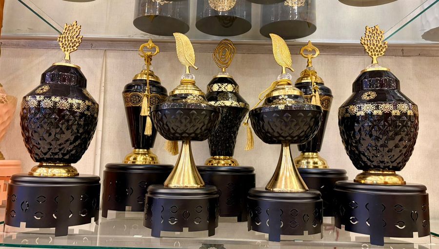 Black and Gold Showpieces on Black Stands