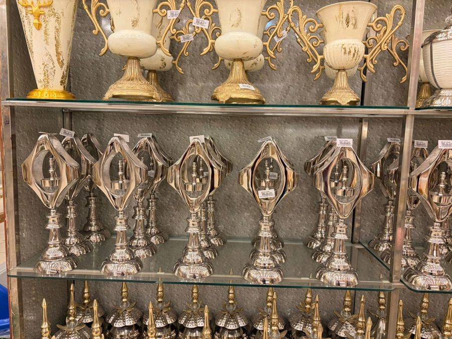 Ivory and Gold Showpieces with Silver Lanterns