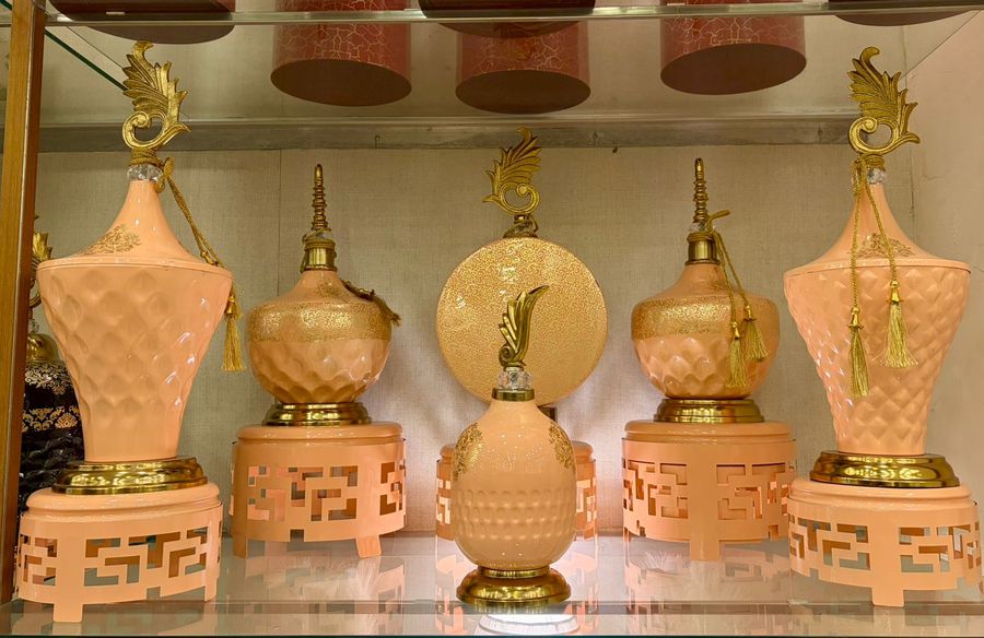 Peach Showpieces with Gold Peacock Tops