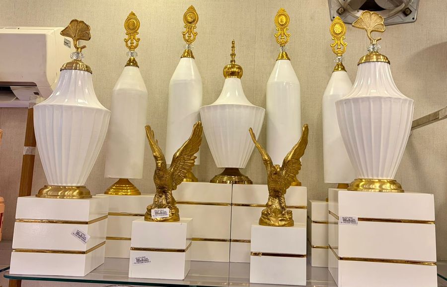 White Fluted Showpieces with Gold Eagles