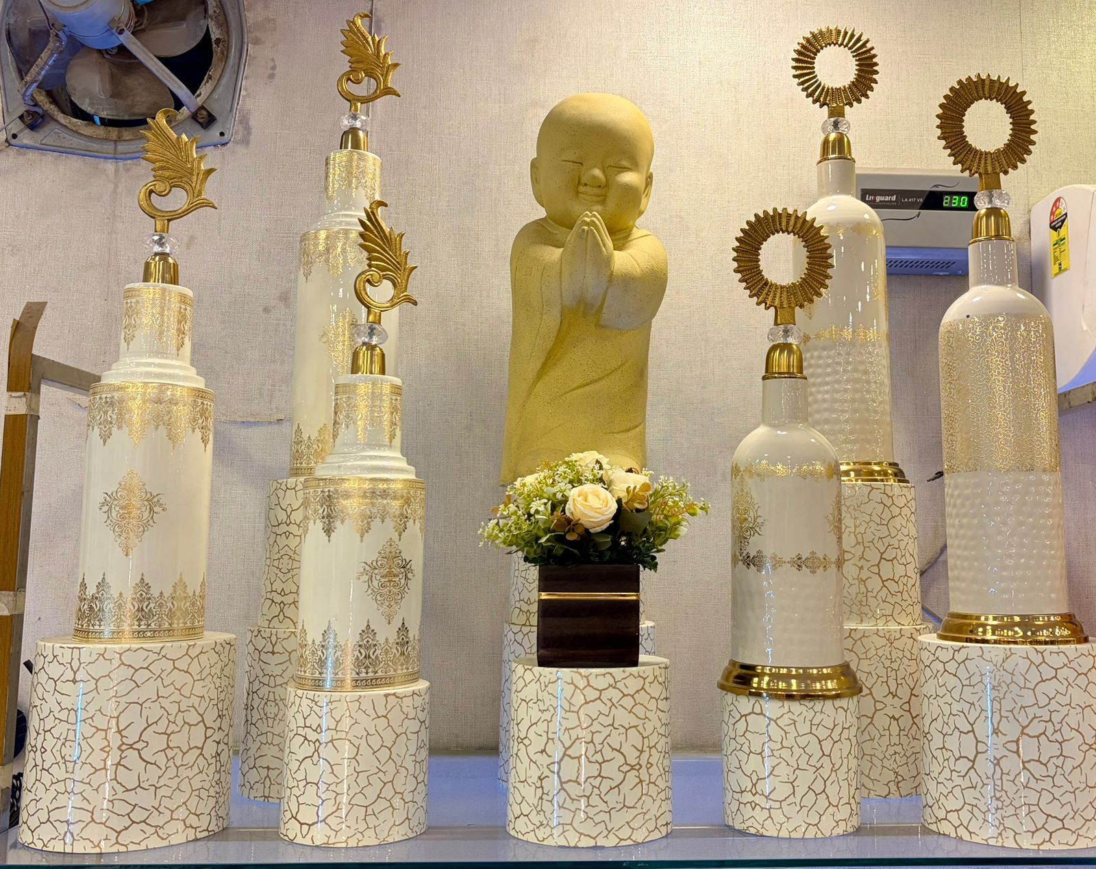 White and Gold Showpieces with Monk Figure