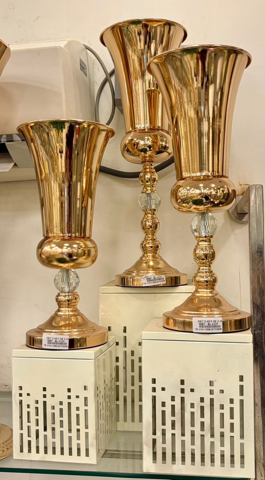 Gold Trumpet Vases on White Stands